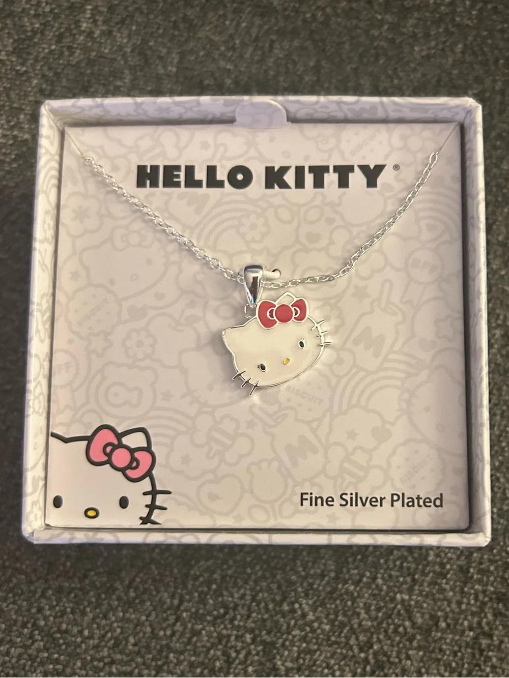 NEW Hello Kitty Silver Plated Pendant with Pink Bow and Yellow Nose